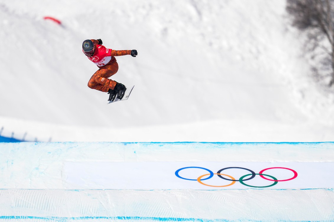 Team Canada snowboarder Eliot Grondin competes in the men’s snowboard cross event during Beijing 2022
