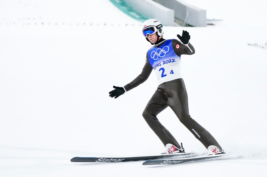Mackenzie Boyd-Clowes reacts to landing a good ski jump