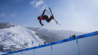 Noah Bowman performs a ski trick in the halfpipe