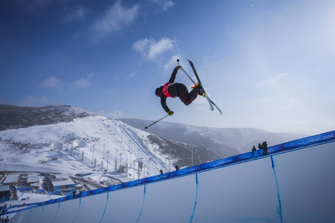 Noah Bowman performs a ski trick in the halfpipe