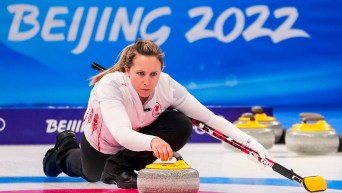Rachel Homan delivers her stone from the hack
