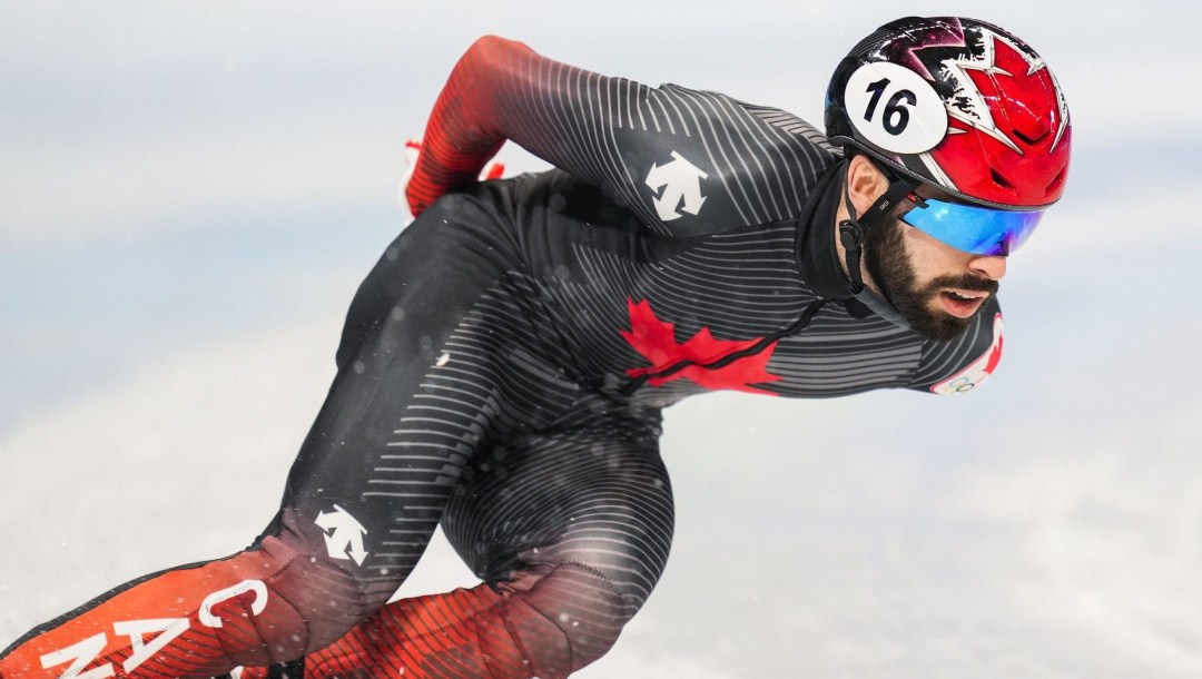 Steven Dubois skates in a short track speed skating race