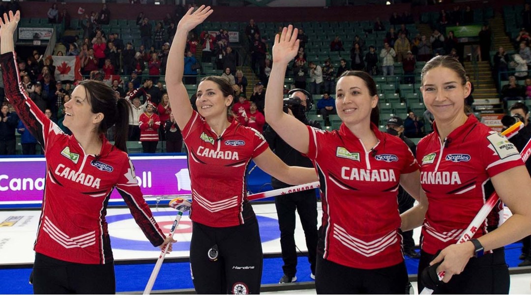Members of Team Canada celebrate after winning bronze