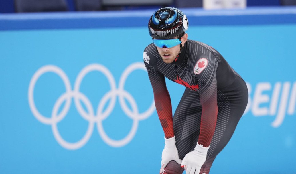 Canada's Pascal Dion looks on after wiping out during the men's 1,000-metre short-track speedskating quarter-final round at the Beijing Winter Olympics in Beijing, China, on Monday, Feb. 7, 2022. THE CANADIAN PRESS/Paul Chiasson