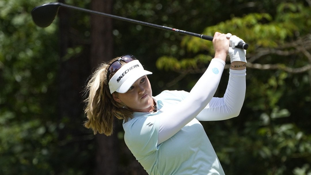 Brooke Henderson finishes her swing after hitting her tee shot