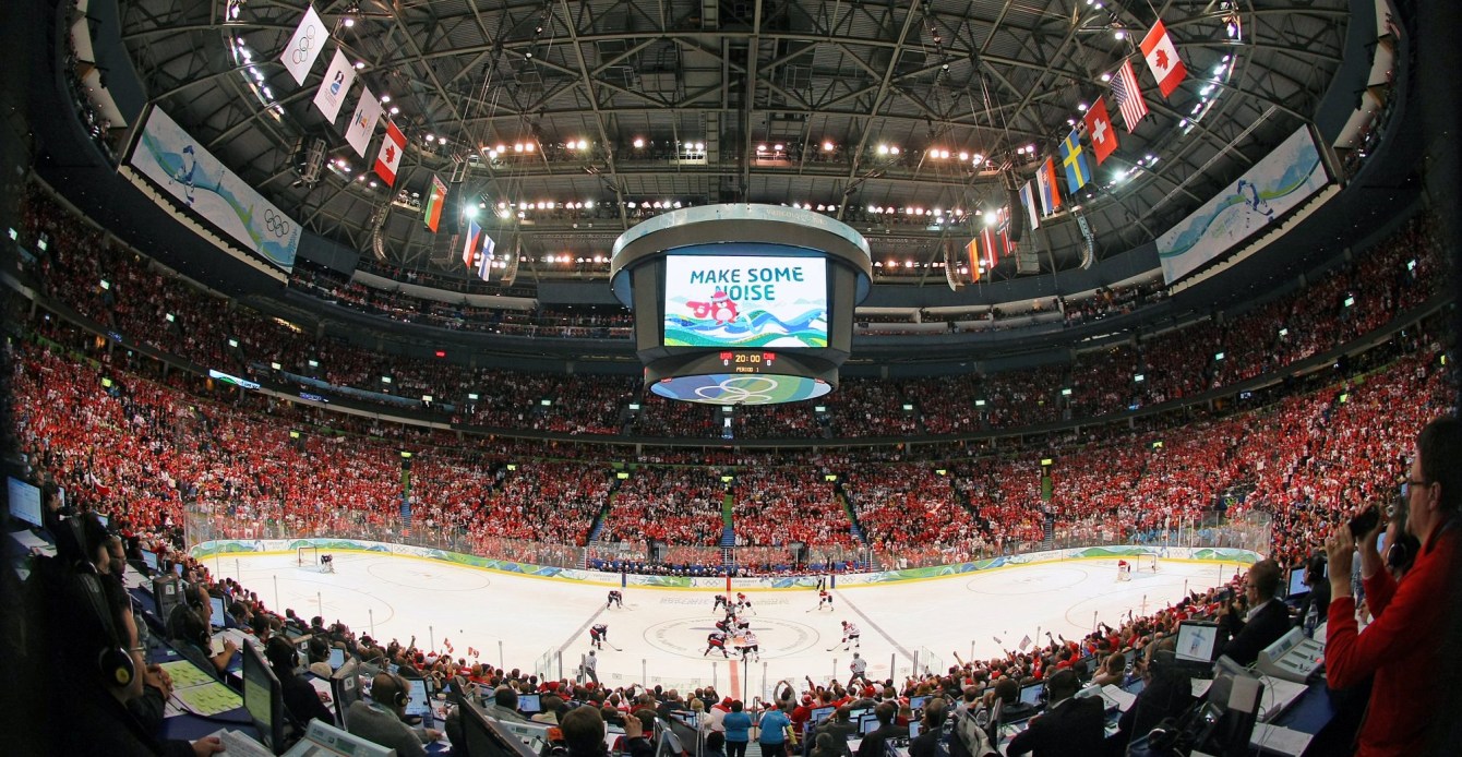 Wide interior shot of Canada Hockey Place filled with fans