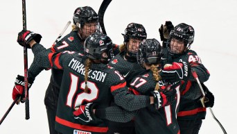 Canada's Kristin O'Neill celebrates after scoring during the IIHF Women's World Championship semifinal