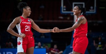 Nirra Fields fist pumps her teammate during a basketball match at the FIBA World Cup quarterfinals against Puerto Rico
