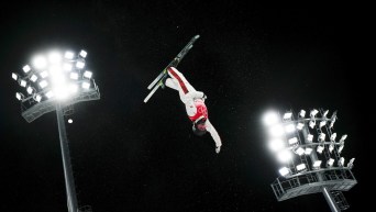Marion Thenault of Canada warms up prior to competing in the freestyle skiing women’s aerials final 1 during the Beijing Winter Olympic Games, in Zhangjiakou, China, Monday, Feb. 14, 2022. THE CANADIAN PRESS/Sean Kilpatrick
