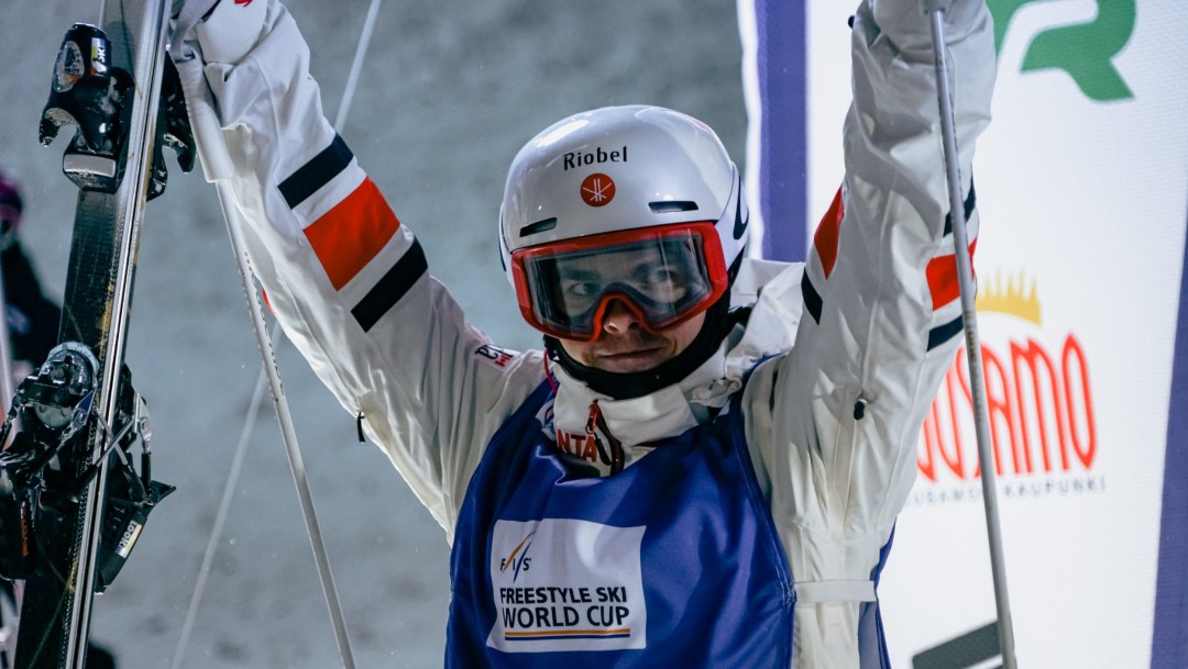 Mikael Kingsbury raises his arms in celebration