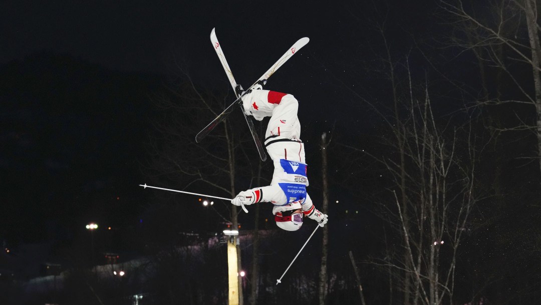 Canada's Mikael Kingsbury skis in the preliminary round of the men's dual moguls freestyle ski world cup at Val Saint-Come, Que., on Saturday, Jan. 28, 2023. THE CANADIAN PRESS/Sean Kilpatrick