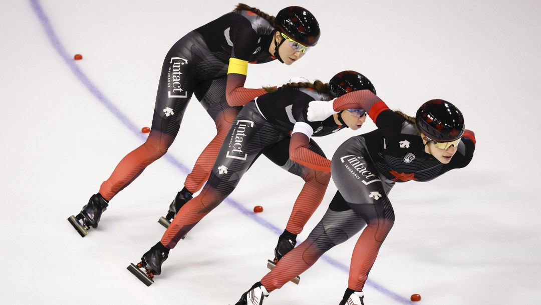 Canada's Isabelle Weidemann, left, Valerie Maltais, right, and Ivanie Blondin skate during the women's team pursuit competition at the ISU World Cup speed skating event in Calgary, Alta., Saturday, Dec. 10, 2022.THE CANADIAN PRESS/Jeff McIntosh