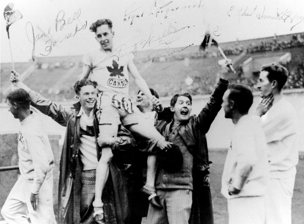 Percy Williams is carried on the shoulders of his teammates after winning a rave