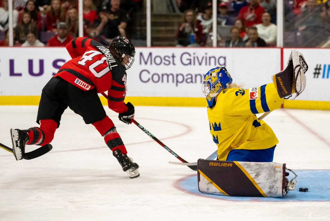 Blayre Turnbull scores against Sweden at the 2023 IIHF Women's World Championship.