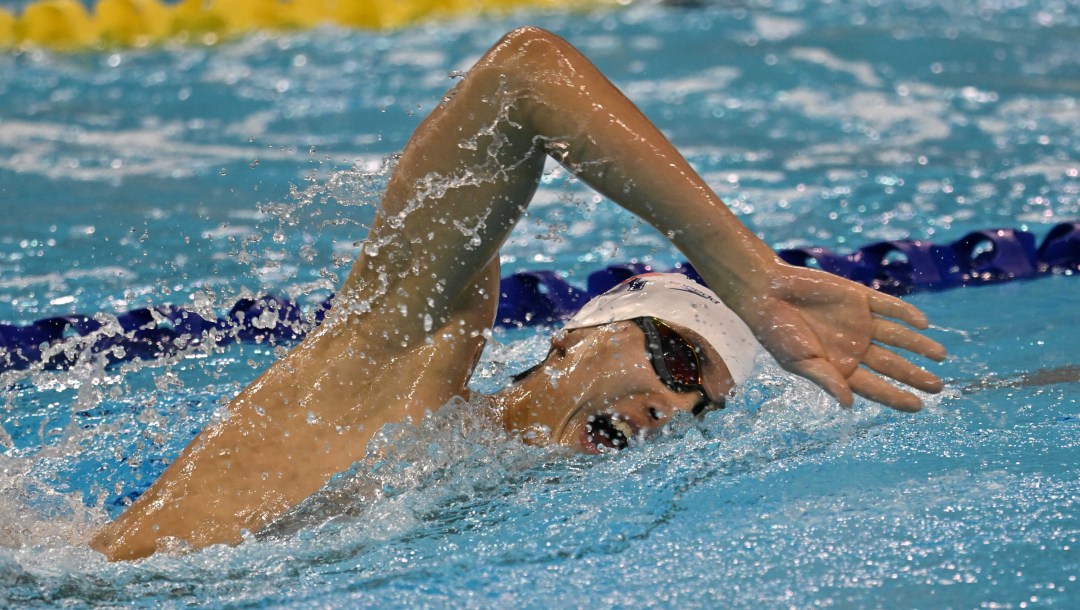 Yu Tong Wu swims in a freestyle race