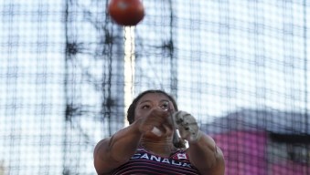 Camryn Rogers of Canada makes an attempt in the Women's hammer throw final during the athletics competition in the Alexander Stadium at the Commonwealth Games in Birmingham, England, Saturday, Aug. 6, 2022. (AP Photo/Alastair Grant)