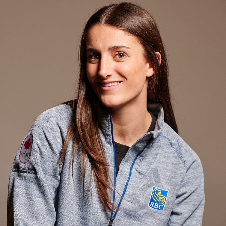 JJ Hawkrigg poses in an RBC Olympians shirt