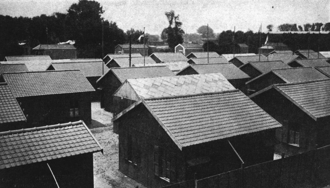 Black and white photo of small wooden houses 