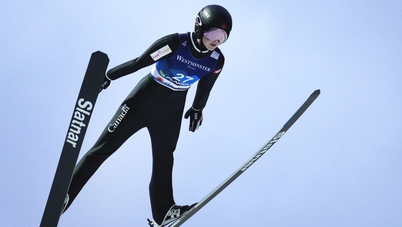 Canada's Alexandria Loutitt soars through the air during the Women's Normal Hill Individual ski jumping event at the Nordic World Ski Championships in Planica, Slovenia, Thursday, Feb. 23, 2023.