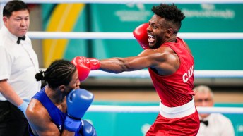 Canadian boxer Junior Petanqui punches his opponent
