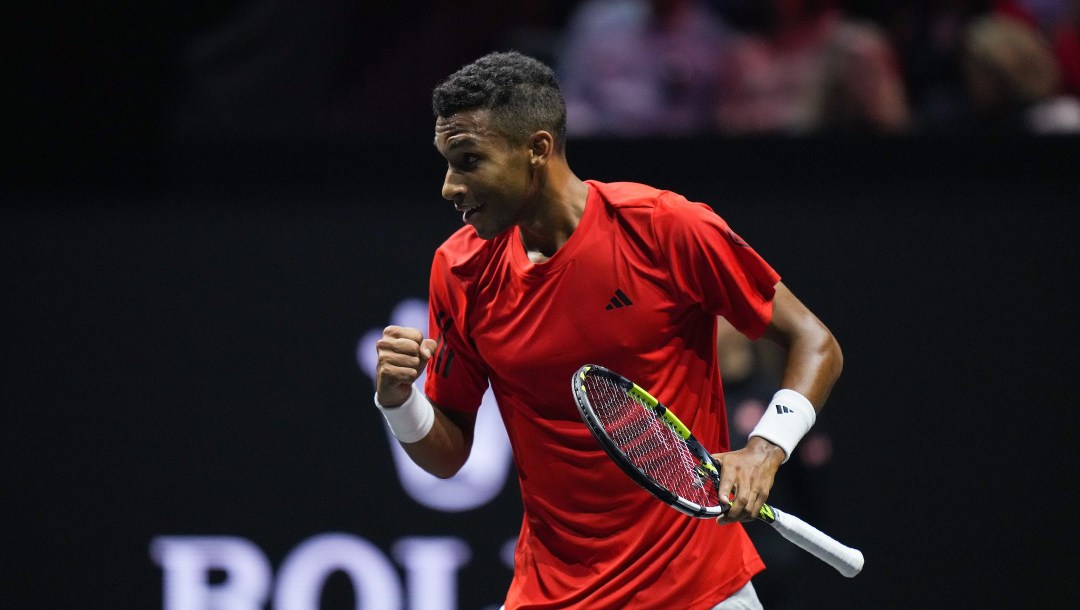 Team World's Felix Auger-Aliassime celebrates winning a game against Team Europe's Gael Monfils during the first set of a Laver Cup tennis singles match, in Vancouver, on Friday, September 22, 2023. THE CANADIAN PRESS/Darryl Dyck