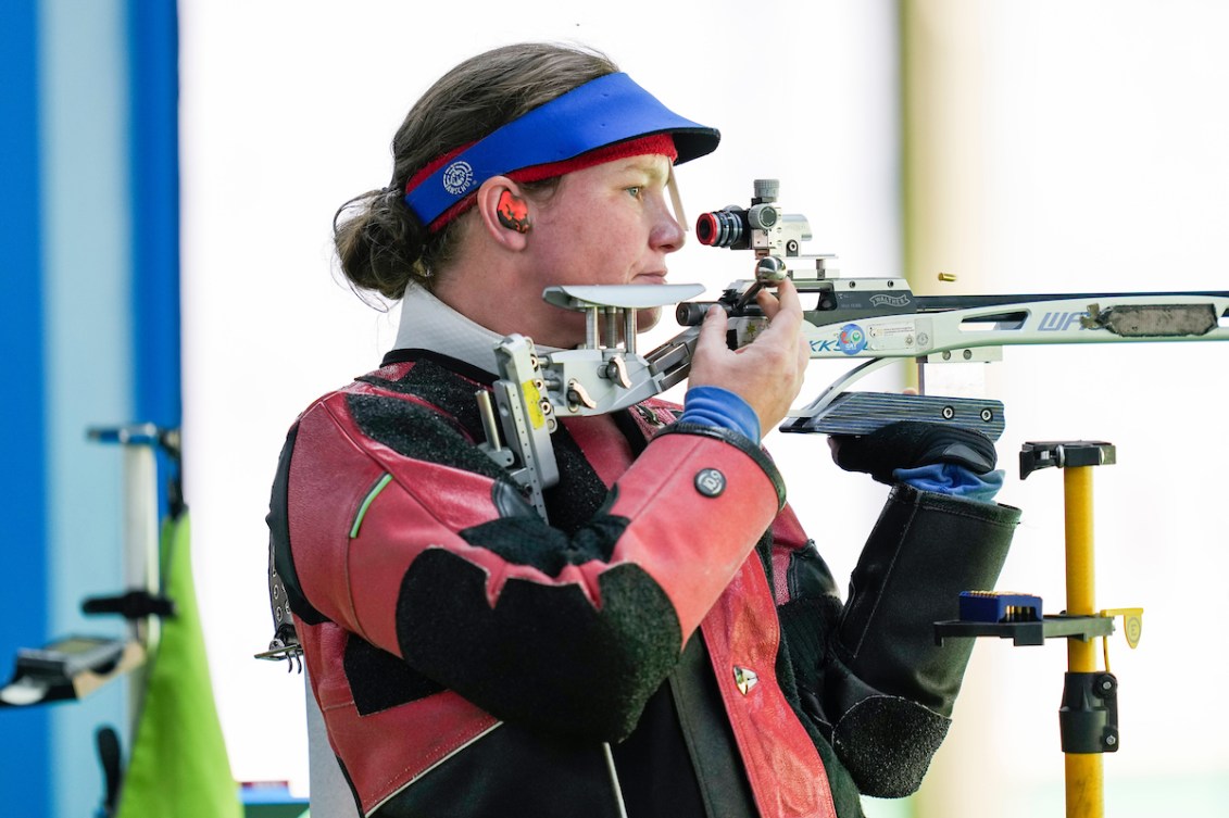 Canadian rifle shooter puts her eye to the view finder
