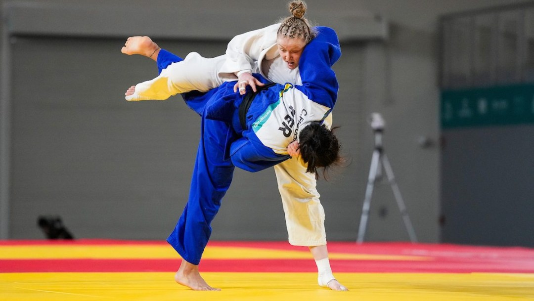 Two judokas grapple with each other