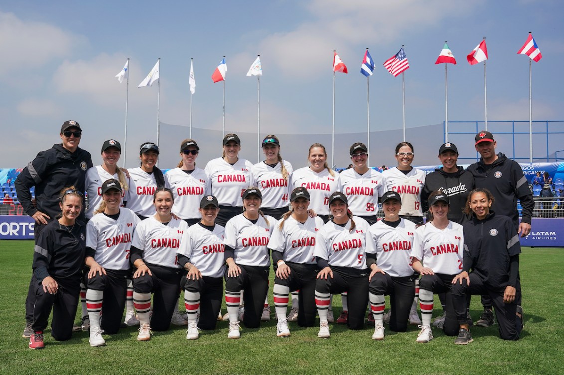 Team Canada poses for a group photo after defeating Peru in Women's Soft Ball action during the Santiago 2023 Pan American Games