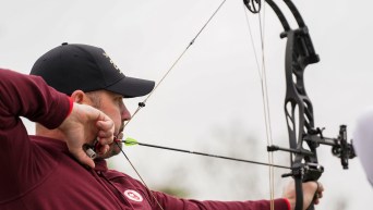 Andrew Fagan lines up his shot with his bow