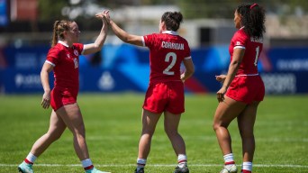 Eden Kilgour high fives her teammate