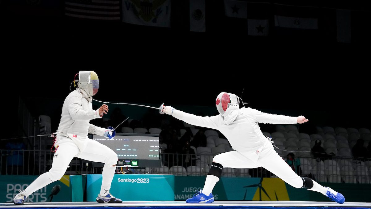 Two fencers duel