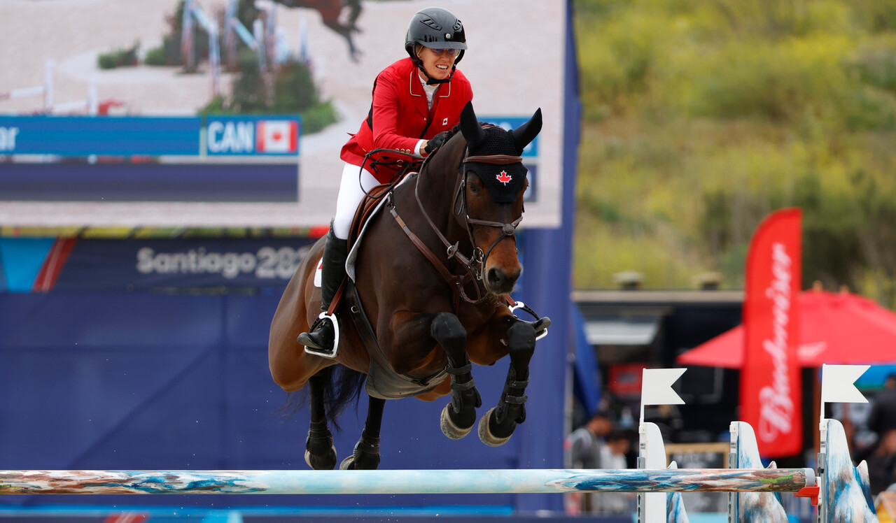 Amy Millar and her horse clear a barrier