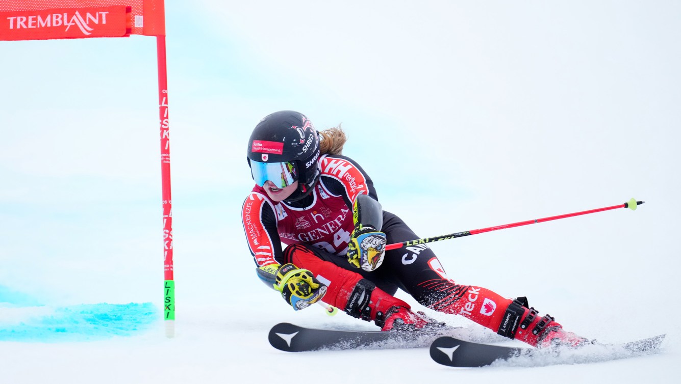 Cassidy Gray clears a gate during a race