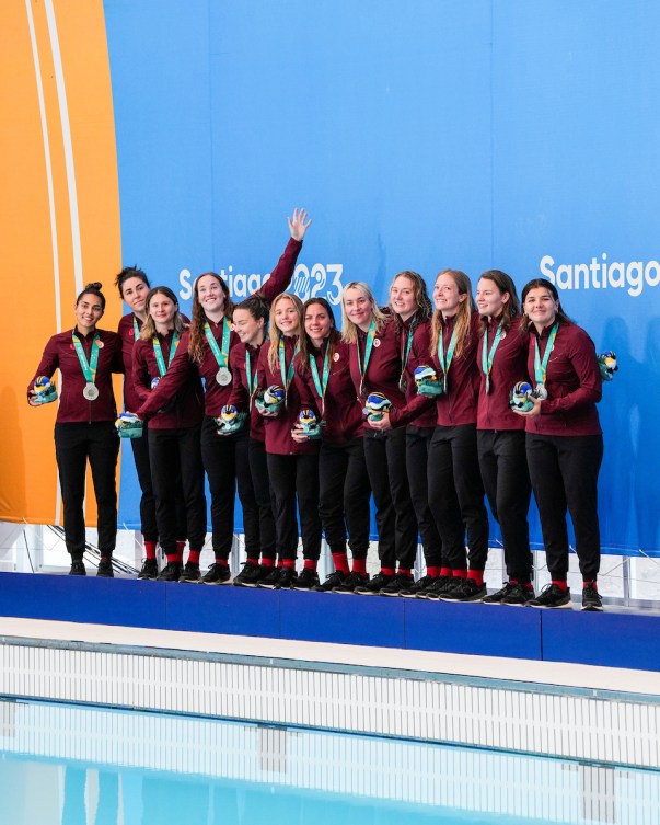 Team Canada's women's water polo team poses with their medals at the Santiago Pan American Games