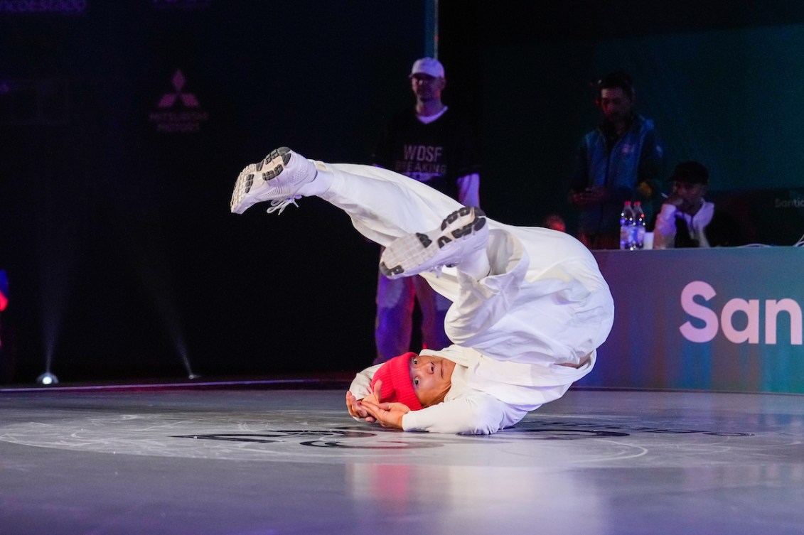 Philip Kim spins on the ground as he competes at the Santiago 2023 Pan Am Games