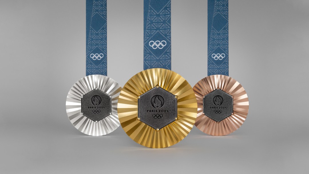 A close up shot of the gold, silver and bronze medals for the Paris 2024 Olympic Games