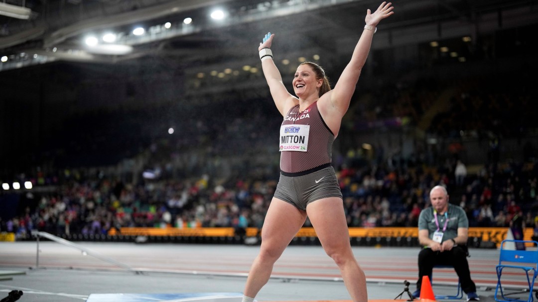 Sarah Mitton, of Canada, reacts after an attempt in the women's shot put during the World Athletics Indoor Championships at the Emirates Arena in Glasgow, Scotland, Friday, March 1, 2024. (AP Photo/Bernat Armangue)