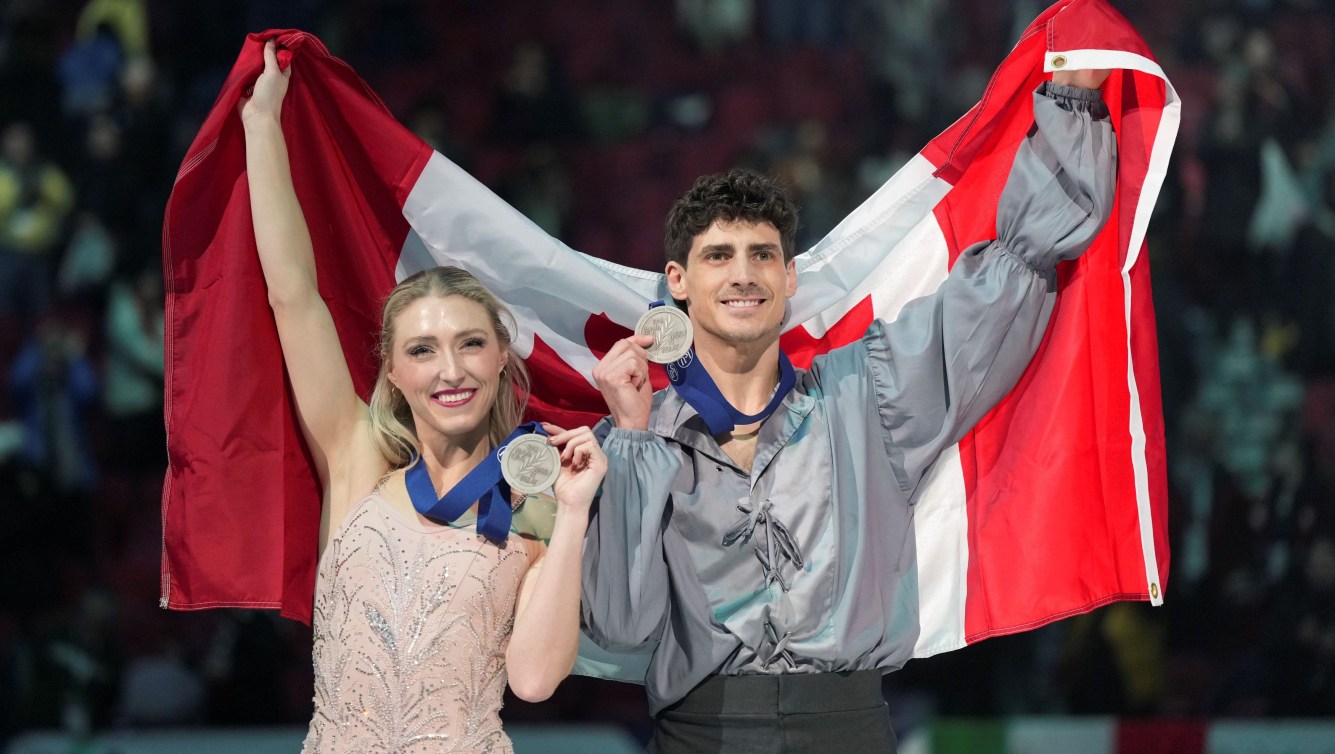 A couple of world championship medalwinning couples lead Canadian