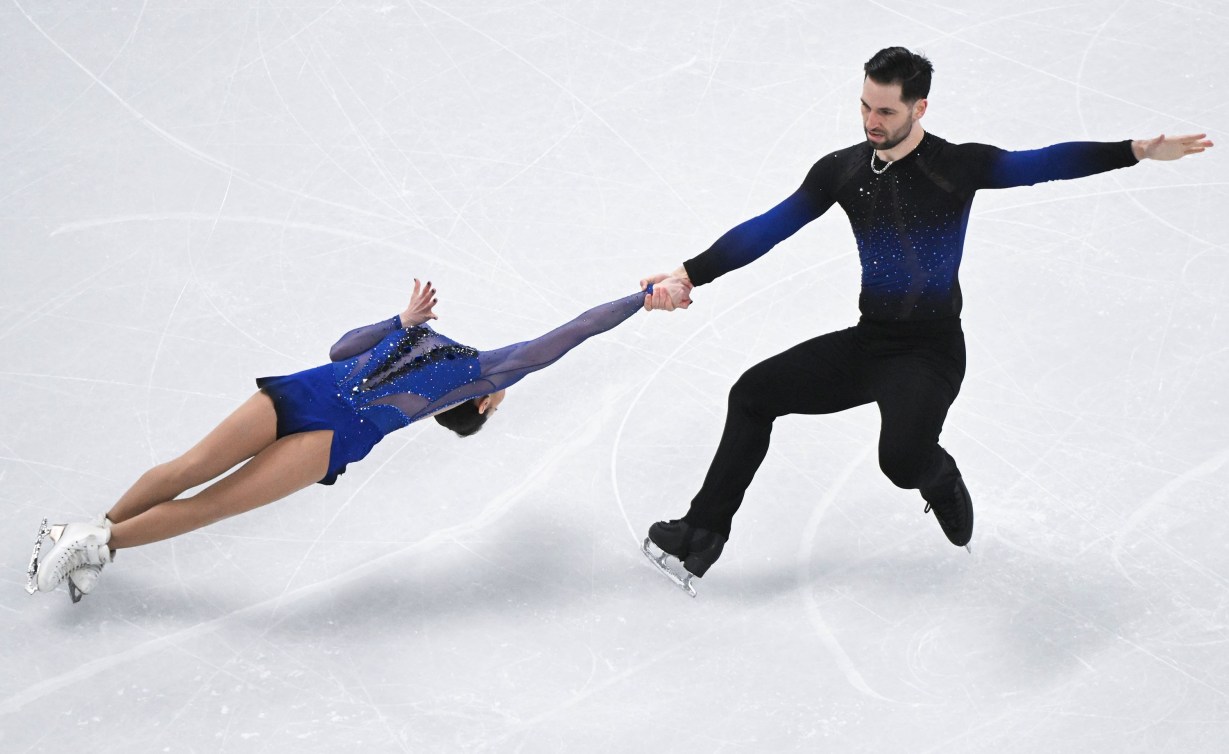 Maxime Deschamps spins his figure skating partner Deanna Stellato-Dudek