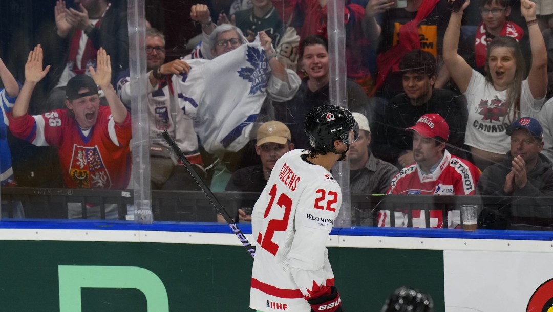 Canada's Dylan Cozens celebrates after scoring his sides second goal during the preliminary round match between Canada and Switzerland at the Ice Hockey World Championships in Prague, Czech Republic, Sunday, May 19, 2024. (AP Photo/Petr David Josek)