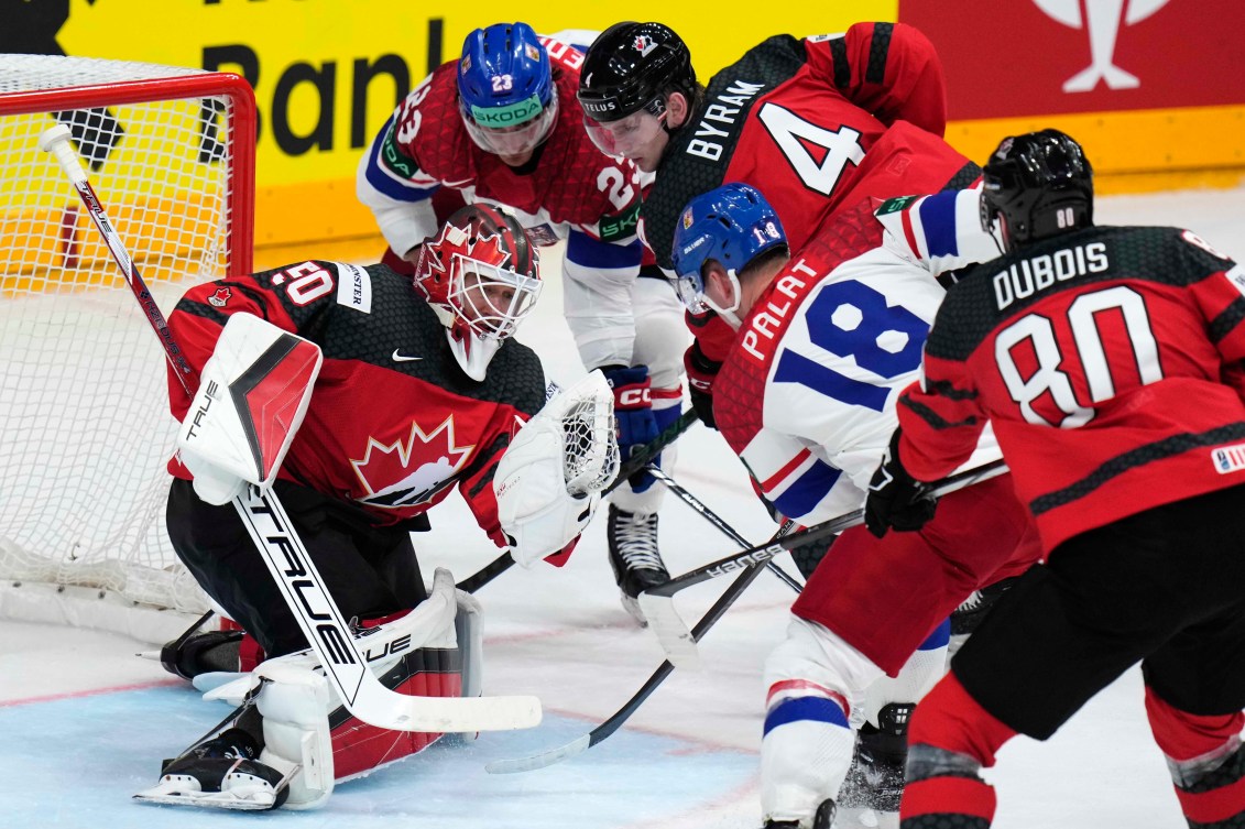 Canada's goalkeeper Jordan Binnington makes a save during the preliminary round match between Czech Republic and Canada at the Ice Hockey World Championships in Prague, Czech Republic, Tuesday, May 21, 2024.