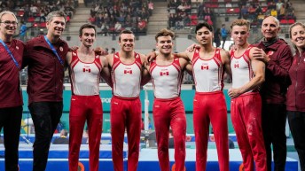 The men's artistic gymnastics team poses for a team photo at the Santiago 2023 Pan Am Games