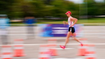 A race walker competes with a blurred background