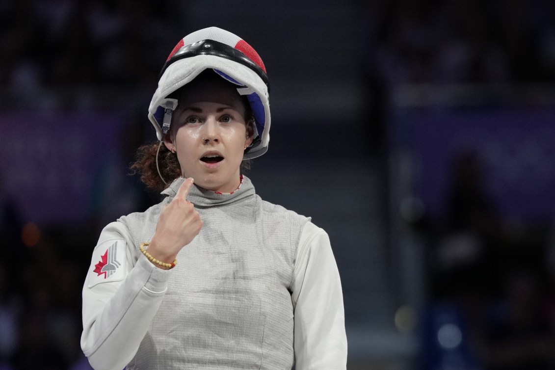Eleanor Harvey reacts after winning bronze at Paris 2024.