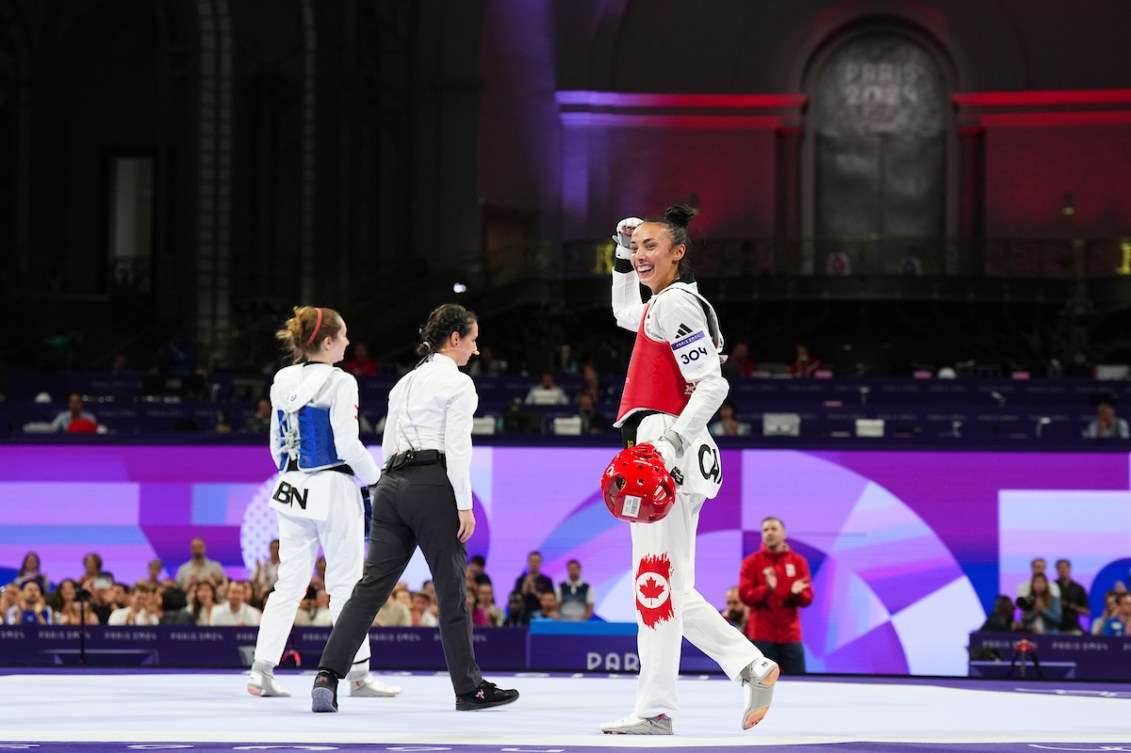 Skylar Park smiles at the crowd after winning a bout 