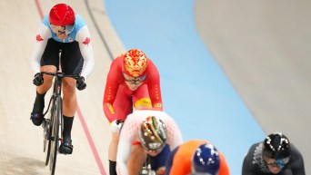 Kelsey Mitchell races in women's keirin