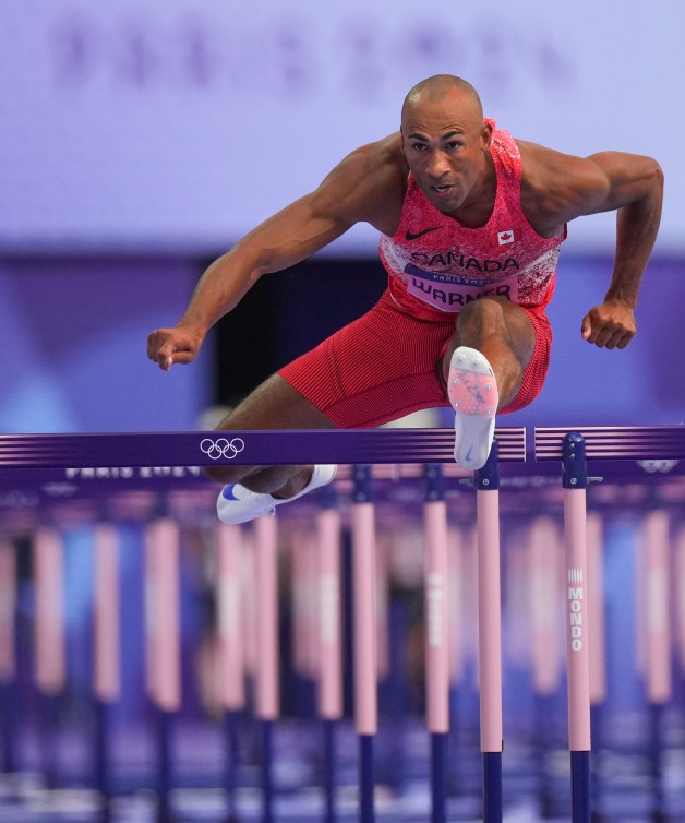 Damian Warner competes in 100 m hurdles during men’s decathlon at the 2024 Paris Olympics Games in France on Tuesday, July 29, 2024. Photo by Leah Hennel/COC