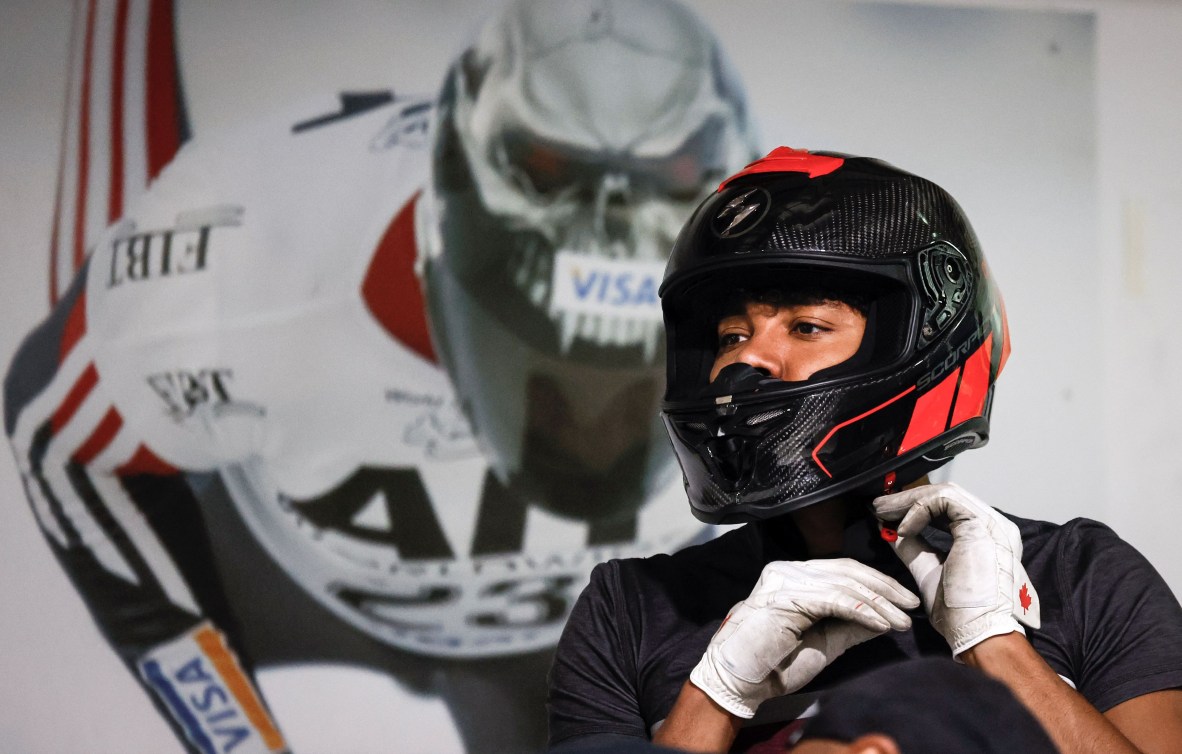 Yohan Eskrick-Parkinson puts on his bobsleigh helmet