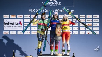 Marielle Thompson (centre) wins gold for Canada in ski cross