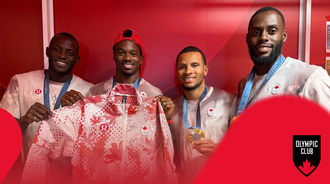 Men's 4x100m team of Blake, Brown, De Grasse, Rodney holding jacket